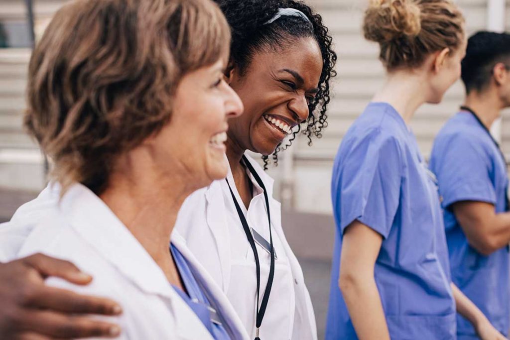 nurses smiling together