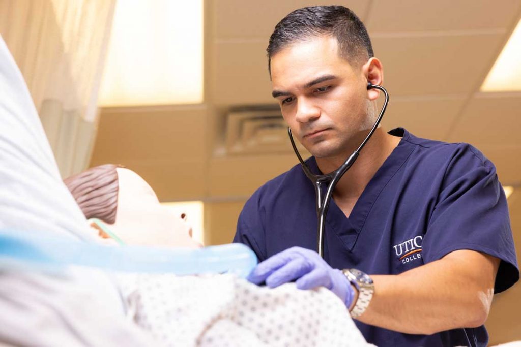 Utica ABSN student in sim lab