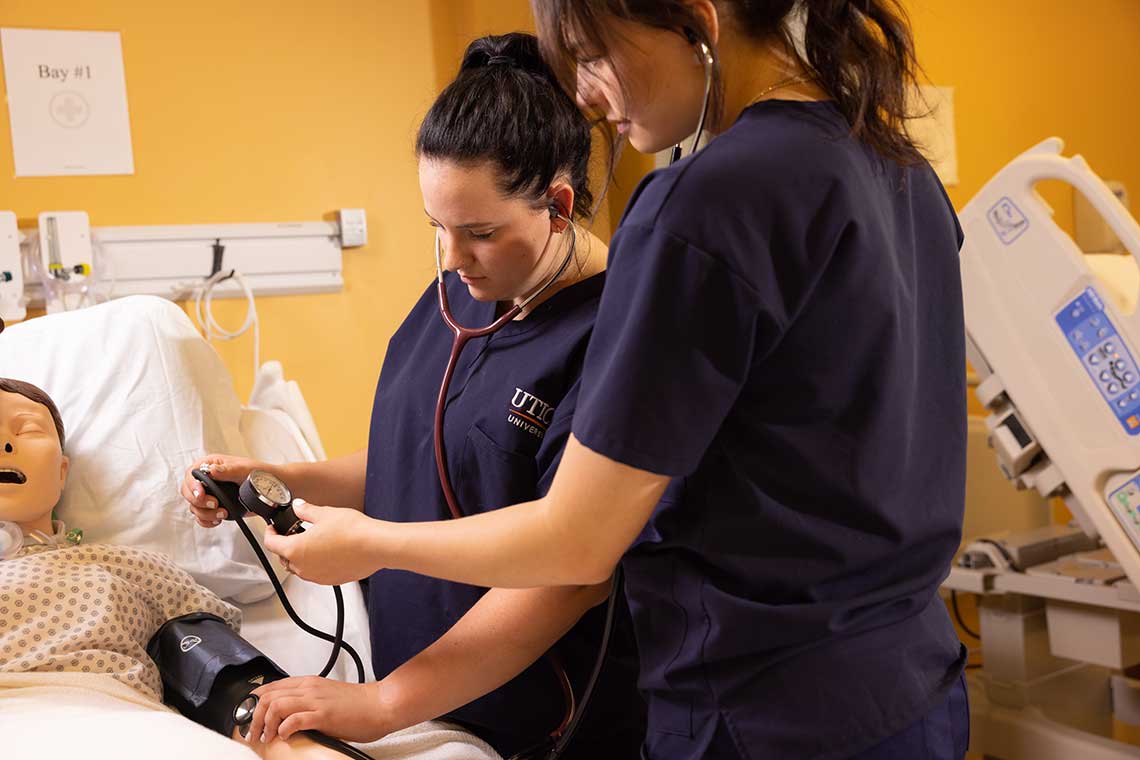 Utica ABSN students in sim lab