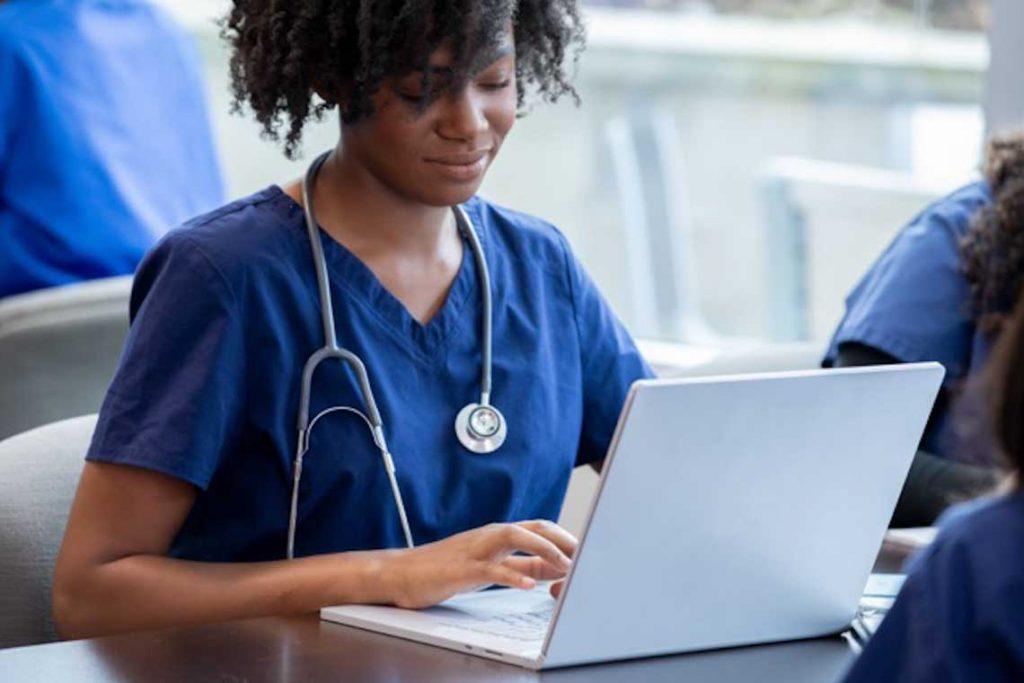 Nursing student studying at desk